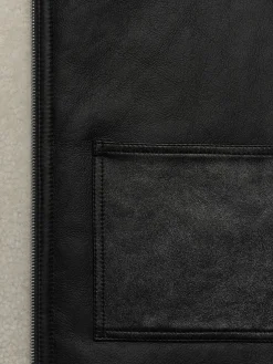 FRAME Shearling Vest in Stone Beige/Black